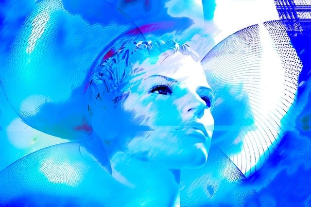 Abstract digital portrait of person with blue neon glowing effects overlaid